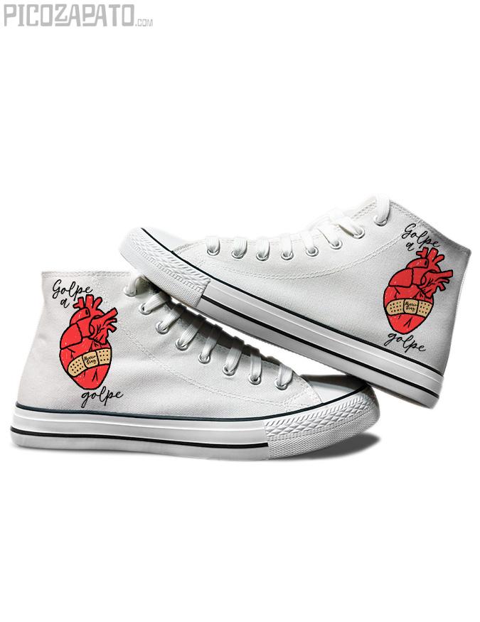 Zapatillas blancas Golpe a golpe